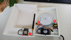 assembly of the esp32-cam module in the philips arbor light fixture